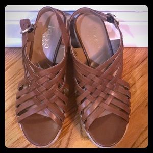 Woman’s Franco Sarto wedges.